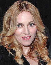 Madonna a cumpărat o casă la suprapreţ în New York