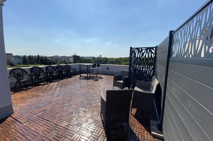Penthouse with a generous terrace, with a superb view of Herastrau Park anunturi imobiliare Bucuresti