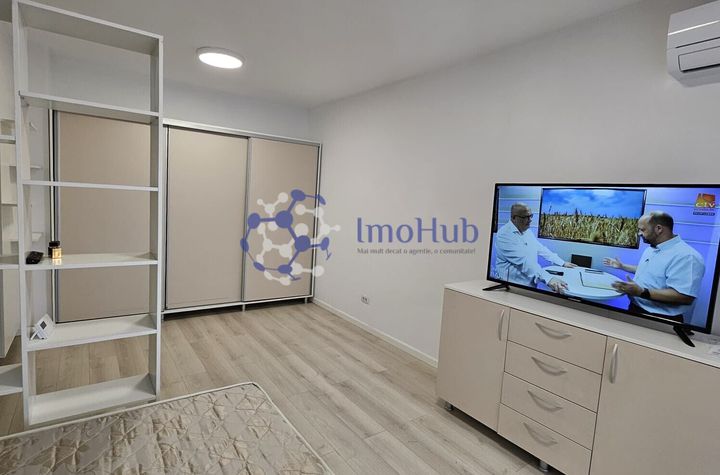 Apartament cu o camera + parcare, Conest Evolution, 400 euro. anunturi imobiliare Iasi