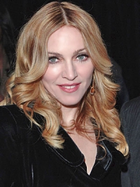 Madonna a cumpărat o casă la suprapreţ în New York